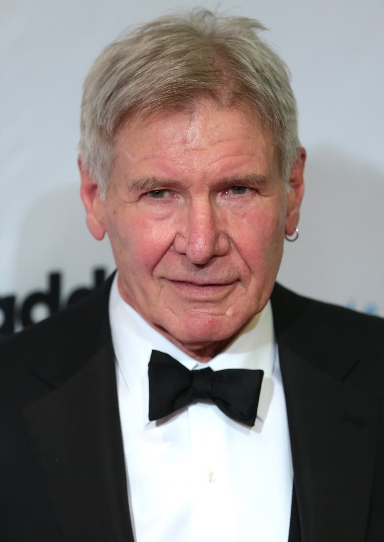 Harrison Ford in a black tie, head and shoulders