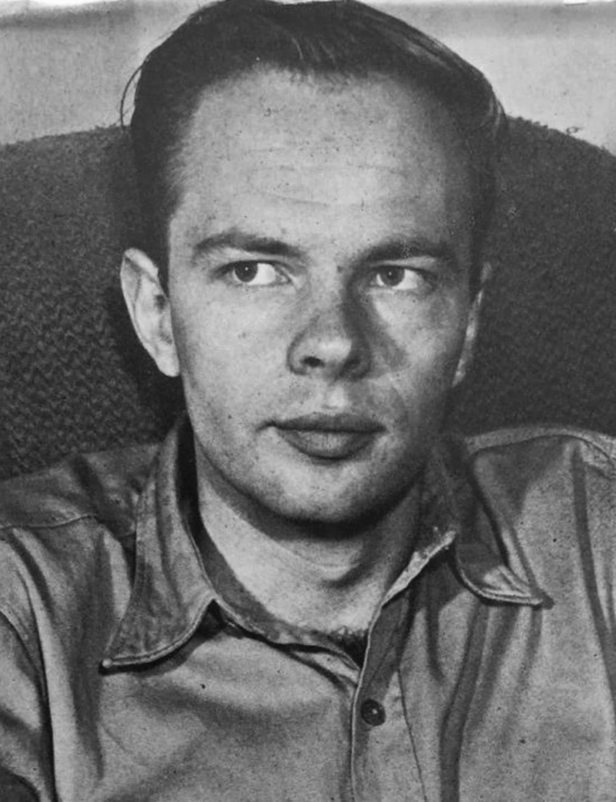 Philip K. Dick as a young man in an open-collared shirt, black and white