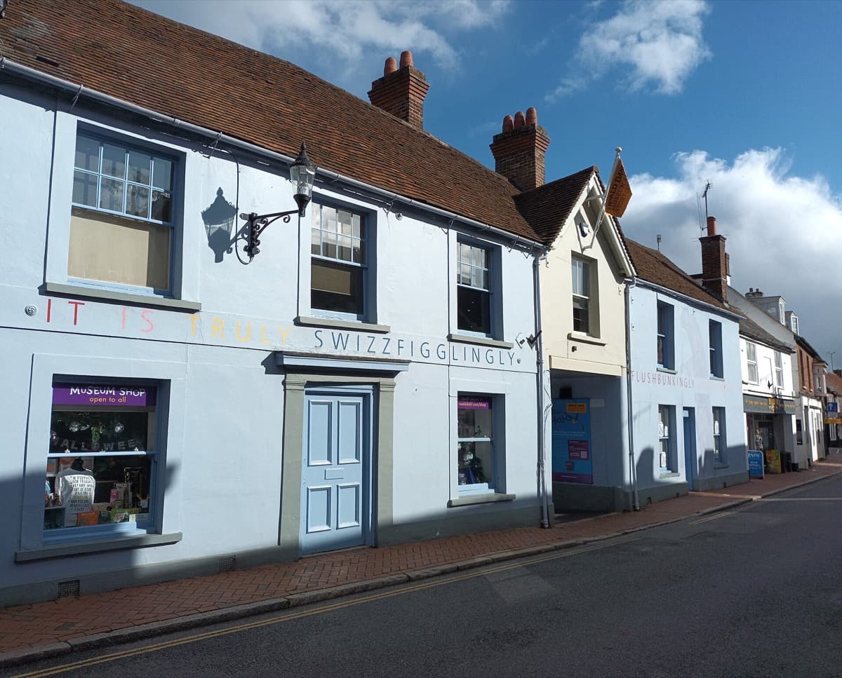 The front of the Roald Dahl Museum, a village building with a coaching-inn arch