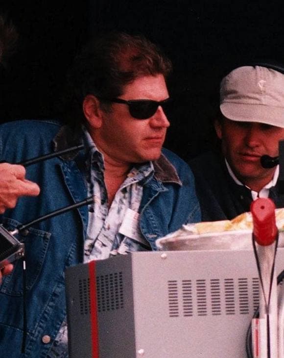 Robert Zemeckis in sunglasses and a denim jacket watching a monitor