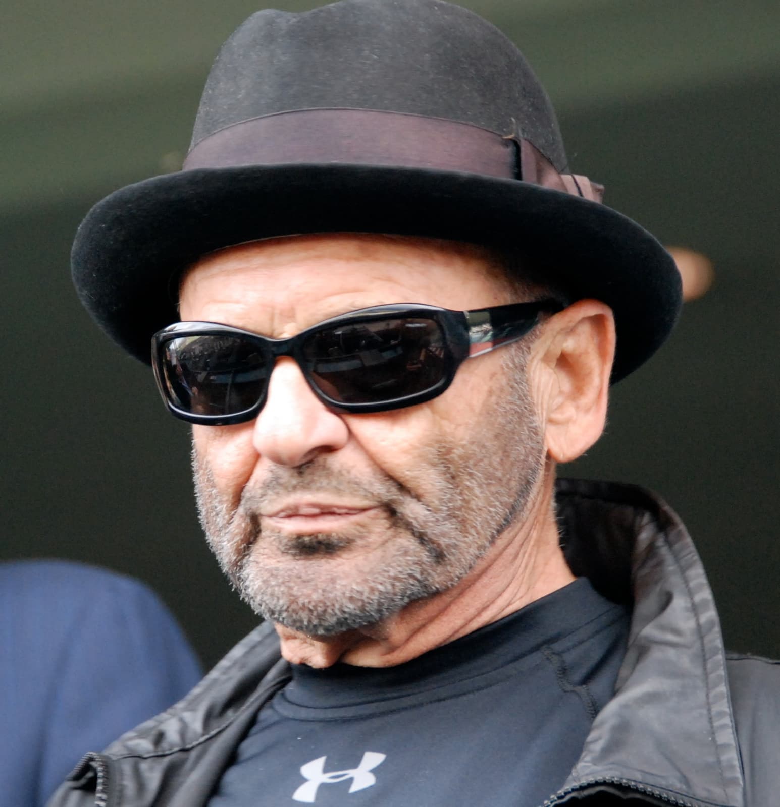 Joe Pesci in a black hat and sunglasses