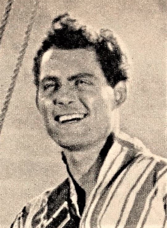 Robert Shaw as a young man, smiling, in a black-and-white magazine photograph