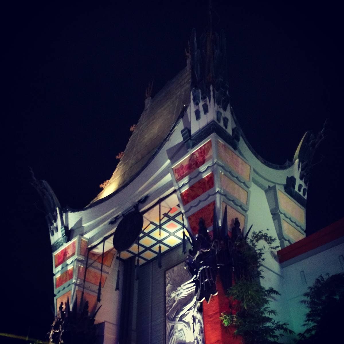 The pagoda-roofed entrance of the Chinese Theatre lit at night