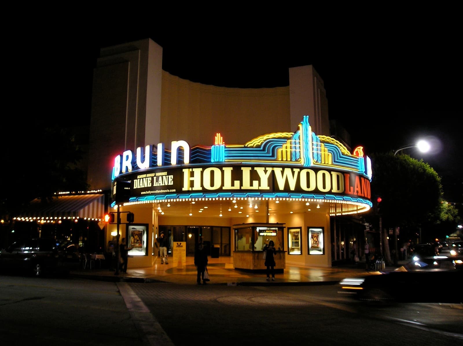 The curved, lit marquee of the Bruin Theatre at night