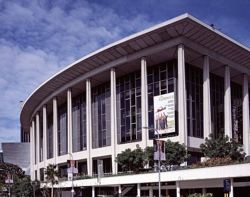 A colonnaded concert hall with tall fluted columns