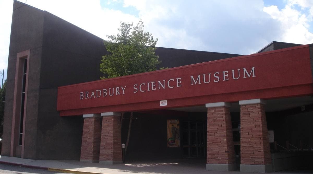 A red-brick museum entrance with a long red sign reading Bradbury Science Museum