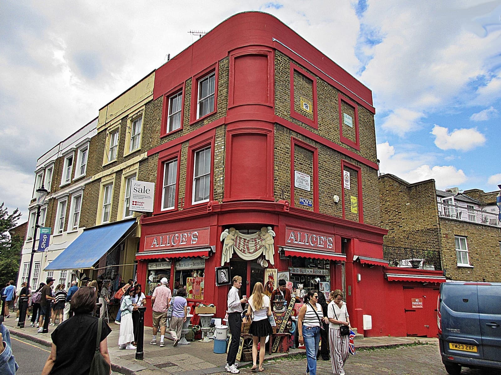 The red shopfront of Alice's antiques shop on Portobello Road