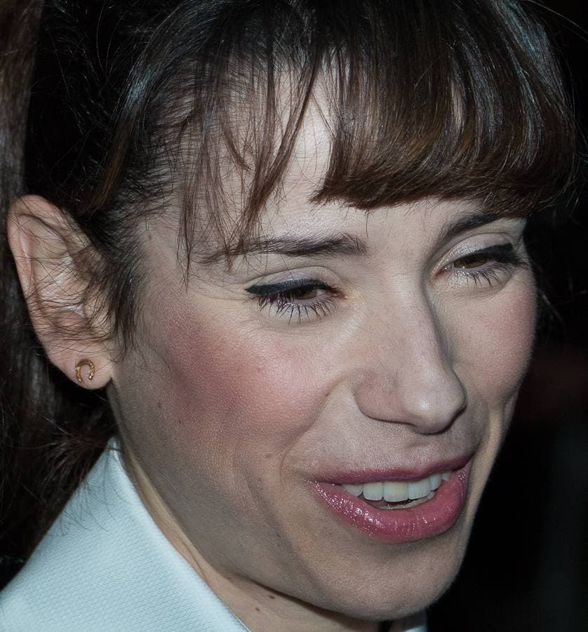 Close portrait of Sally Hawkins with a dark fringe, mid-laugh