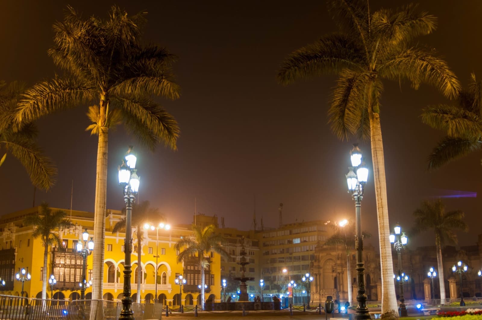 The Plaza Mayor in Lima with its bronze fountain and yellow colonial buildings