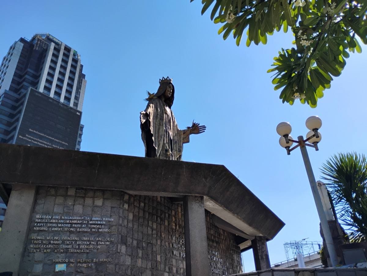 The EDSA Shrine with its statue of the Virgin Mary above the road junction