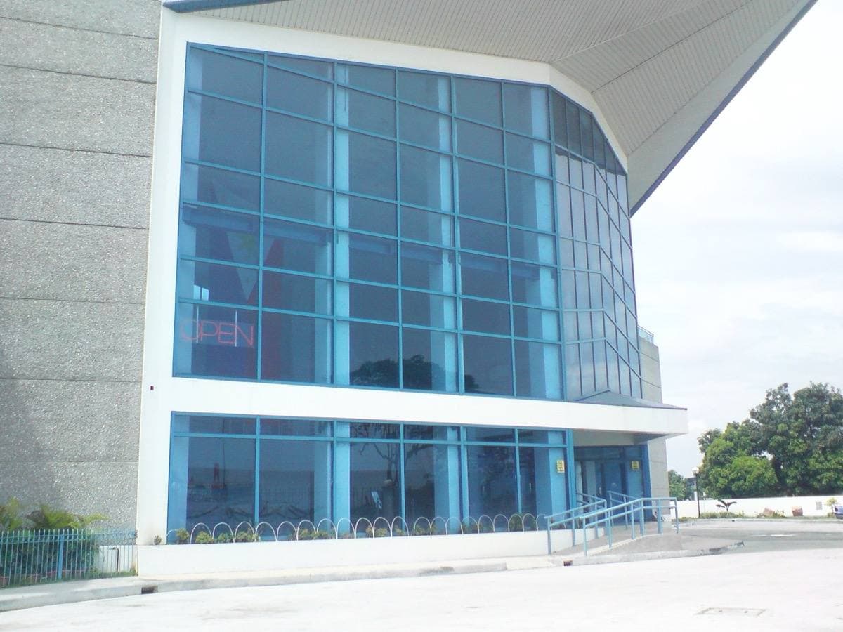 The entrance of the air force museum building with aircraft outside