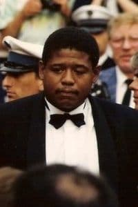 Forest Whitaker in a dinner jacket in a crowd at Cannes, 1988