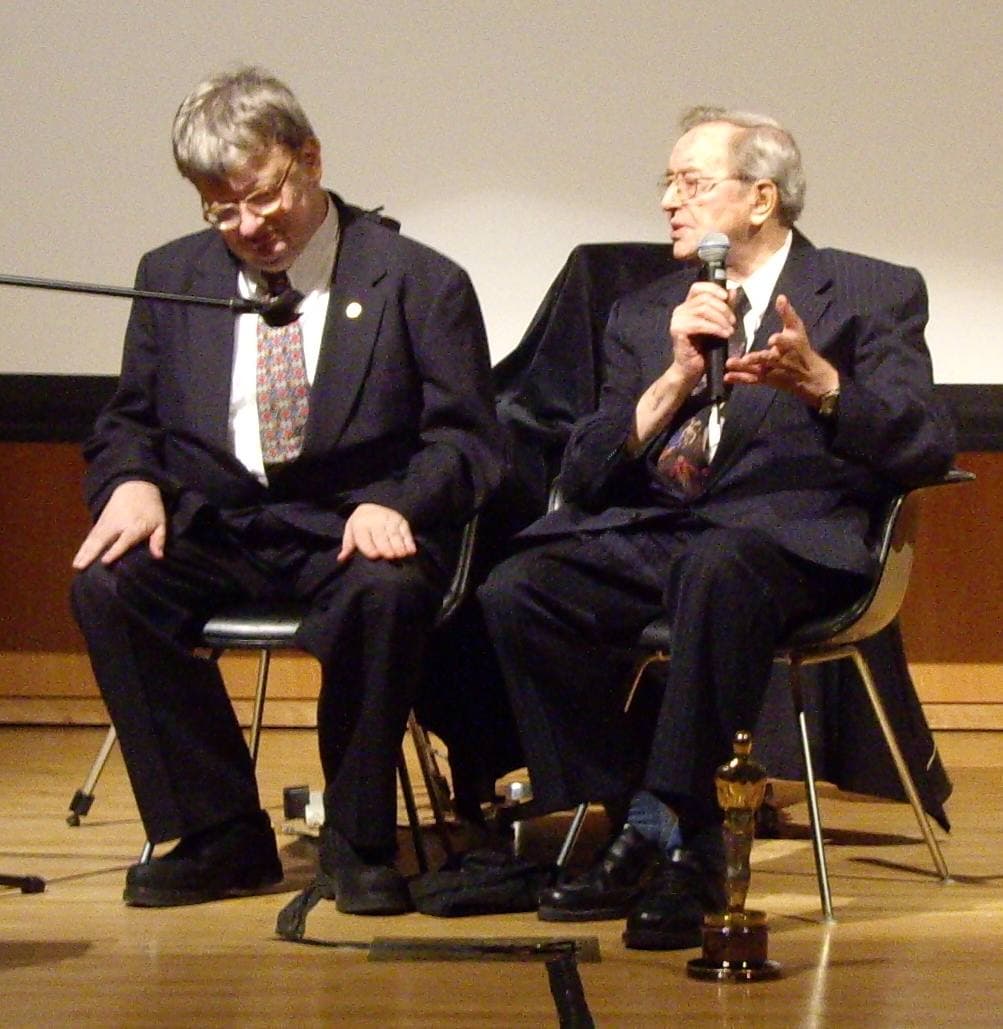 Kim Peek and his father Fran Peek holding an Oscar statuette