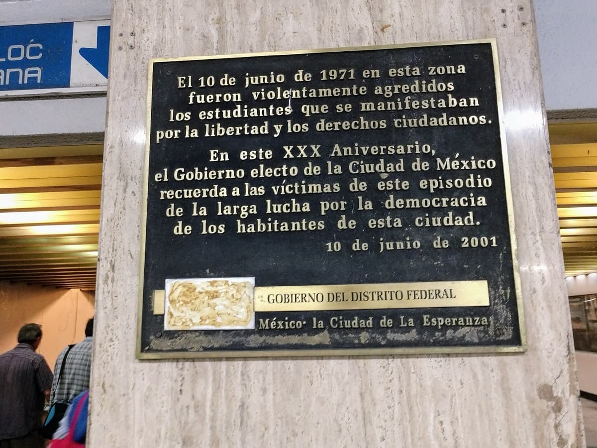 A commemorative plaque on a station wall