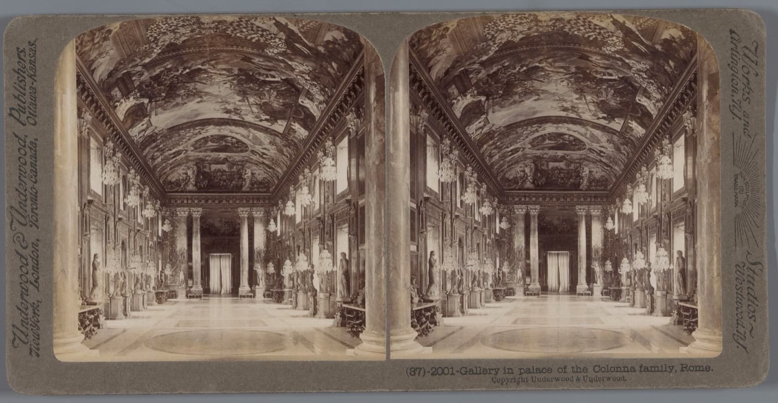 A long gilded hall lined with paintings, statues and chandeliers
