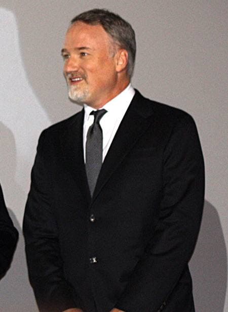 David Fincher in glasses and a dark jacket, 2012
