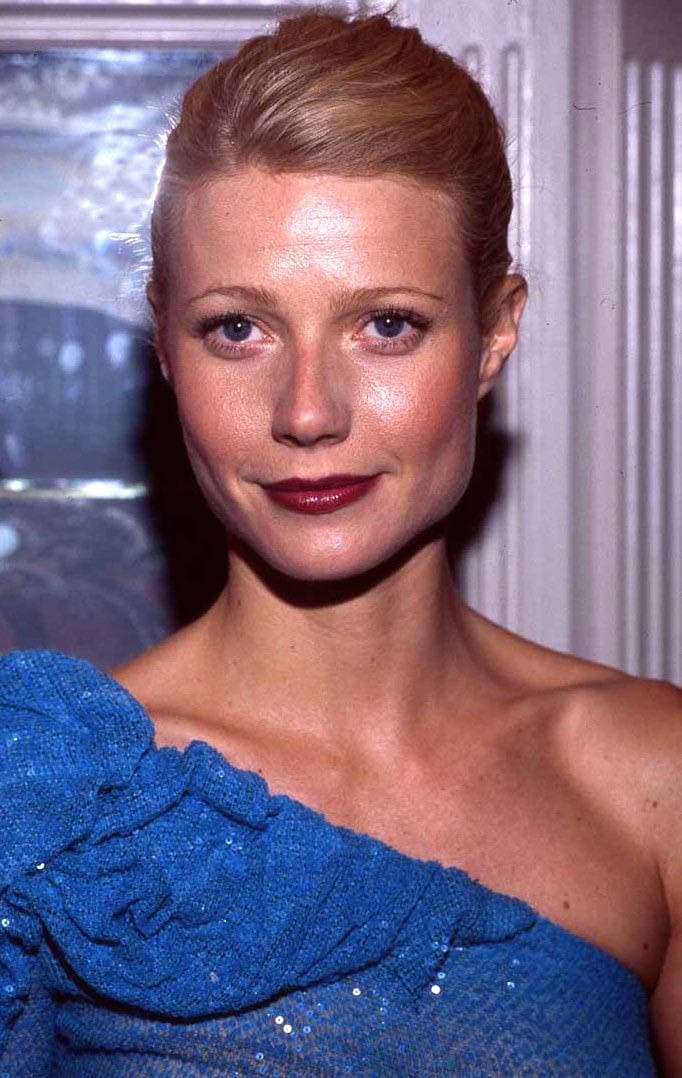 Gwyneth Paltrow with her hair up, smiling, 2000