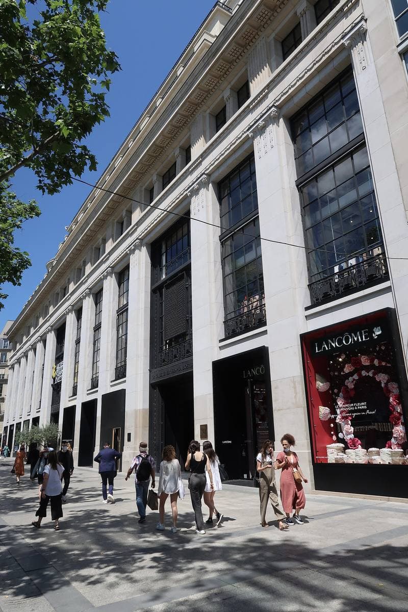 A pale stone department store front on the Champs-Élysées