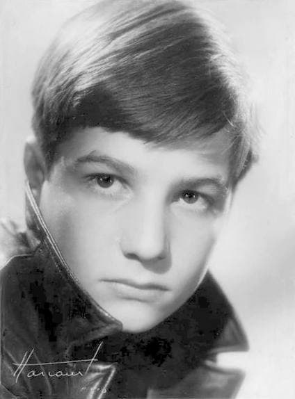Jean-Pierre Léaud as a boy in 1959, a studio portrait in a leather jacket with the collar up