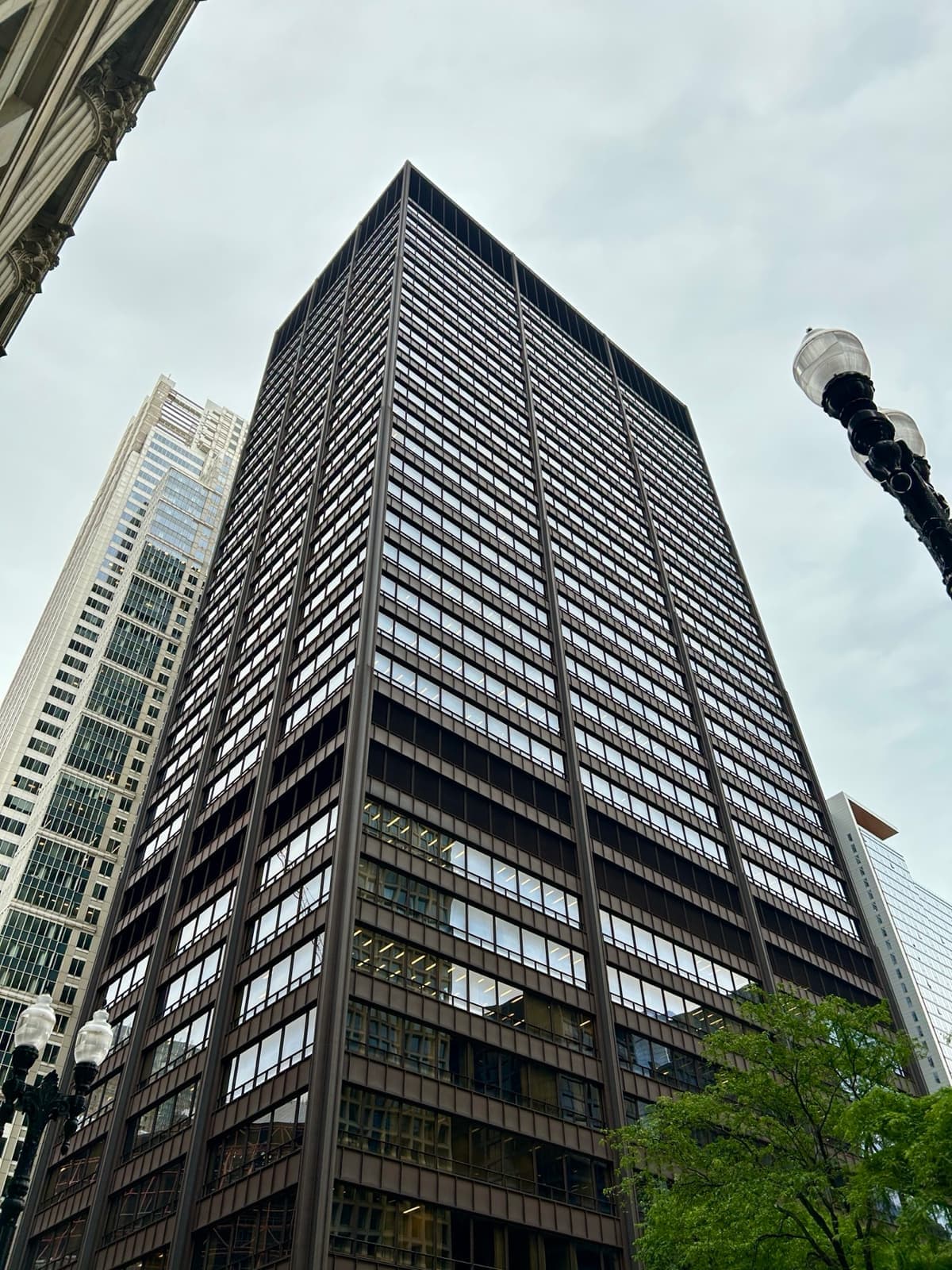 The dark steel tower of the Daley Center seen from below