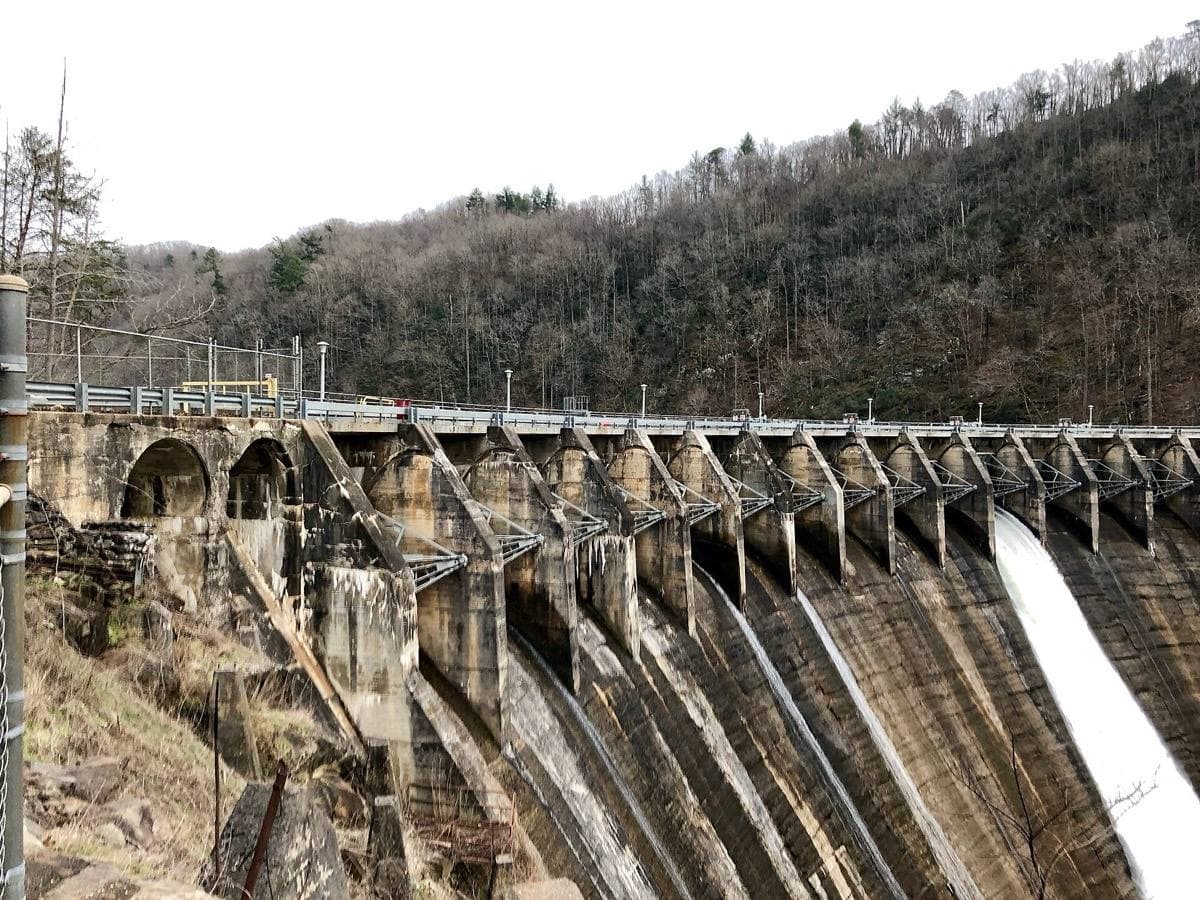 The concrete face of Cheoah Dam above the river