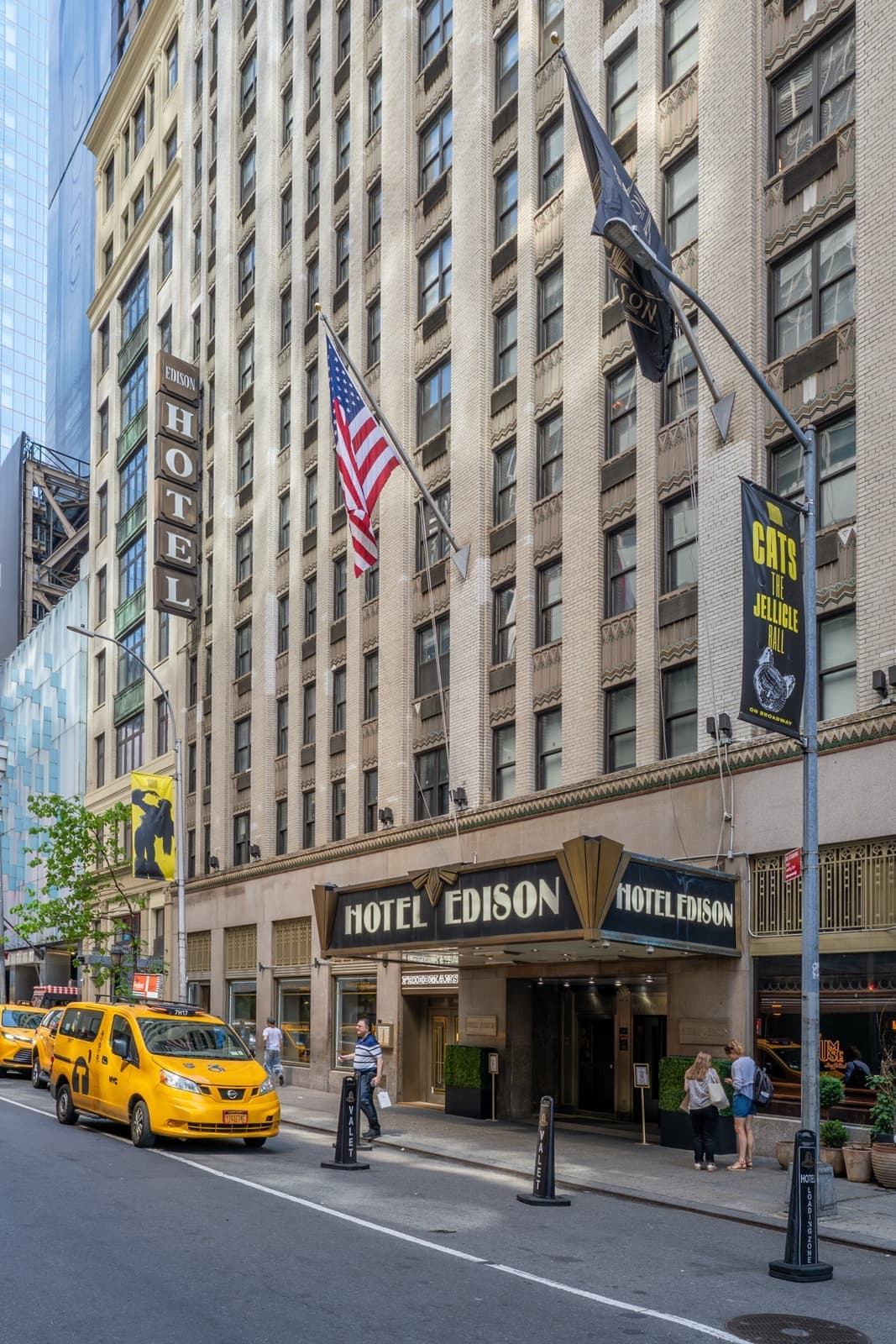 The Hotel Edison's tall brick front and its sign on West 47th Street