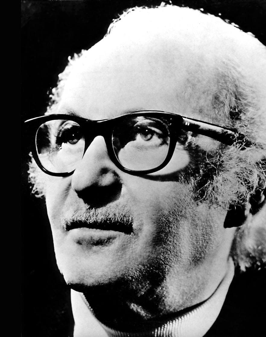 Lee Strasberg, an older man in glasses, in black and white