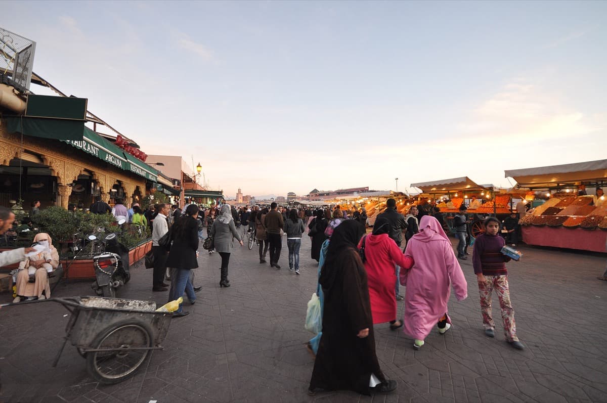Crowds and food stalls across the open square of Jemaa el-Fnaa in Marrakech