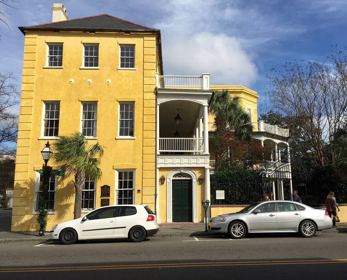 A two-storey Federal house with a long two-storey porch on King Street