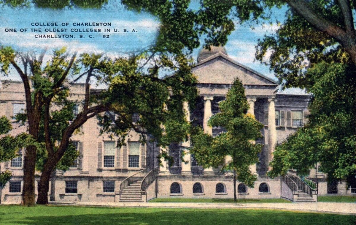 A coloured postcard of Randolph Hall’s columned front behind live oaks, about 1940