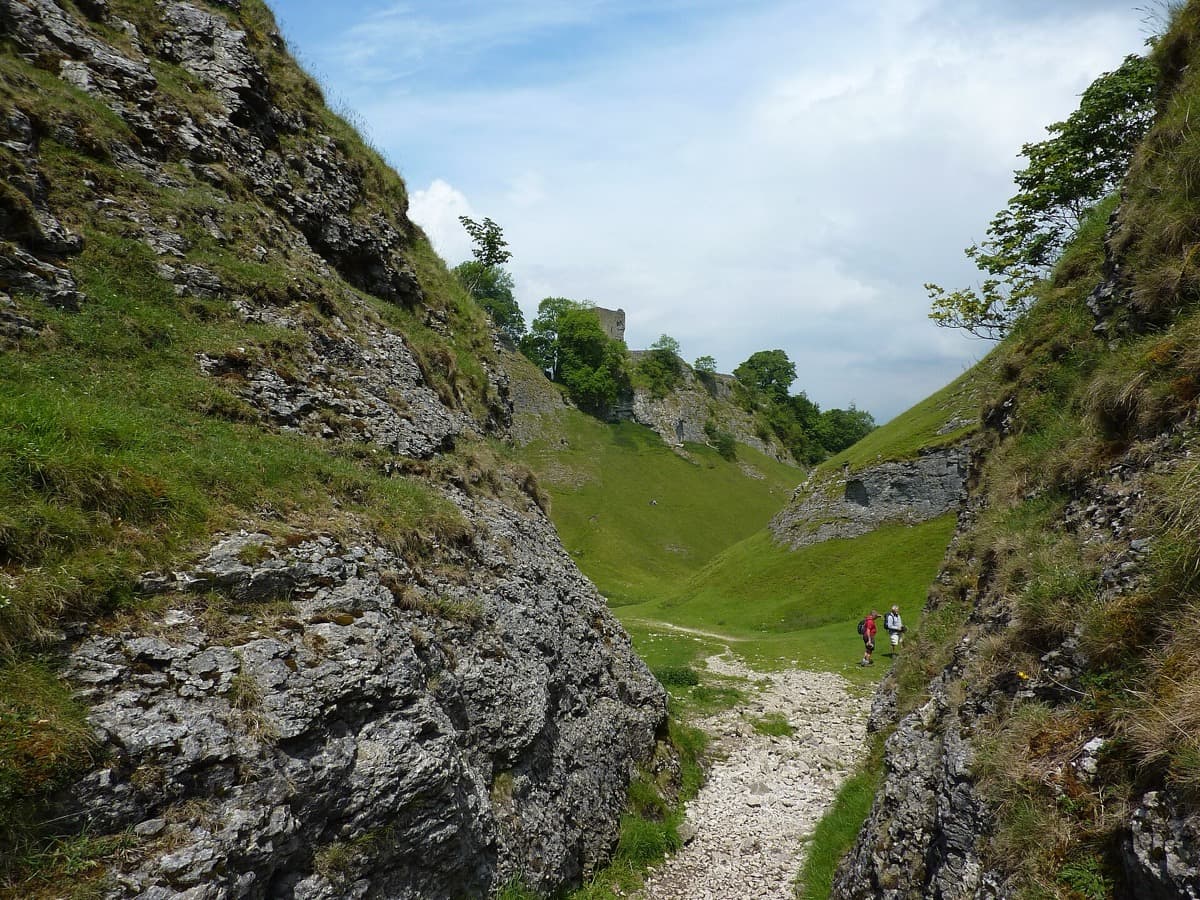 A narrow limestone dale rising from Castleton.