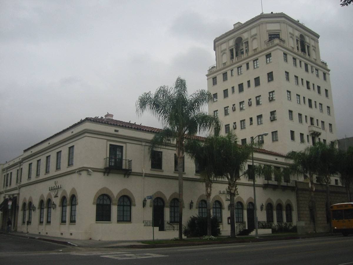 A tall pale 1920s club building on Sunset Boulevard