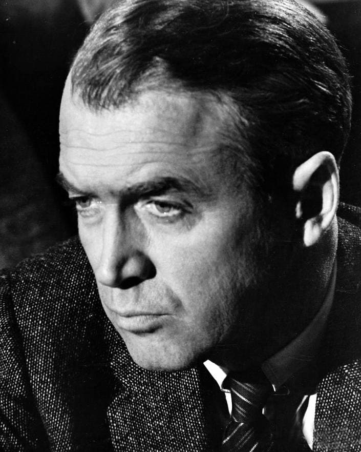 Close portrait of James Stewart looking hard to one side