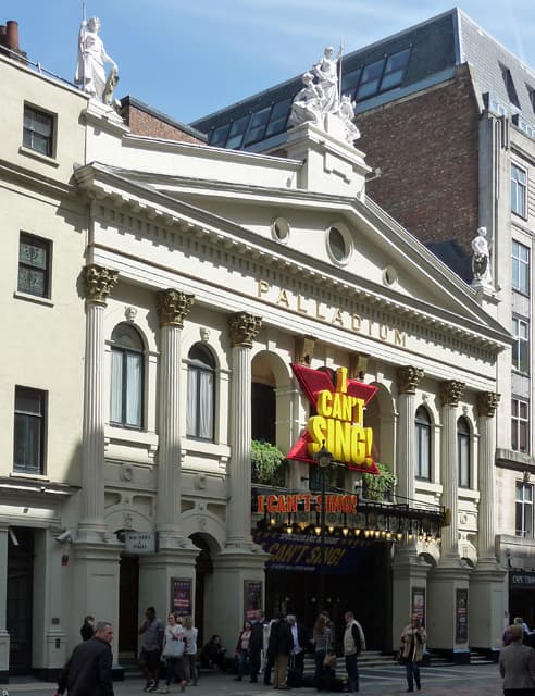 The columned white front of the London Palladium on Argyll Street