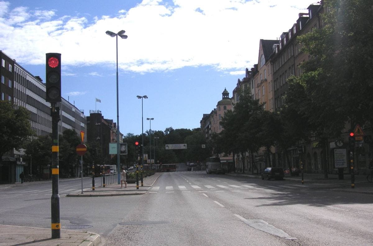 A busy Stockholm square with buses and tall apartment blocks, 2008