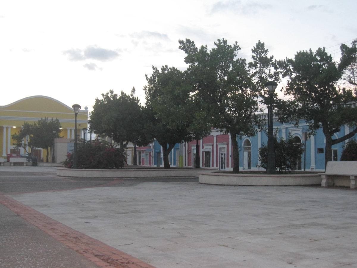Vega Baja’s town square with trees and benches