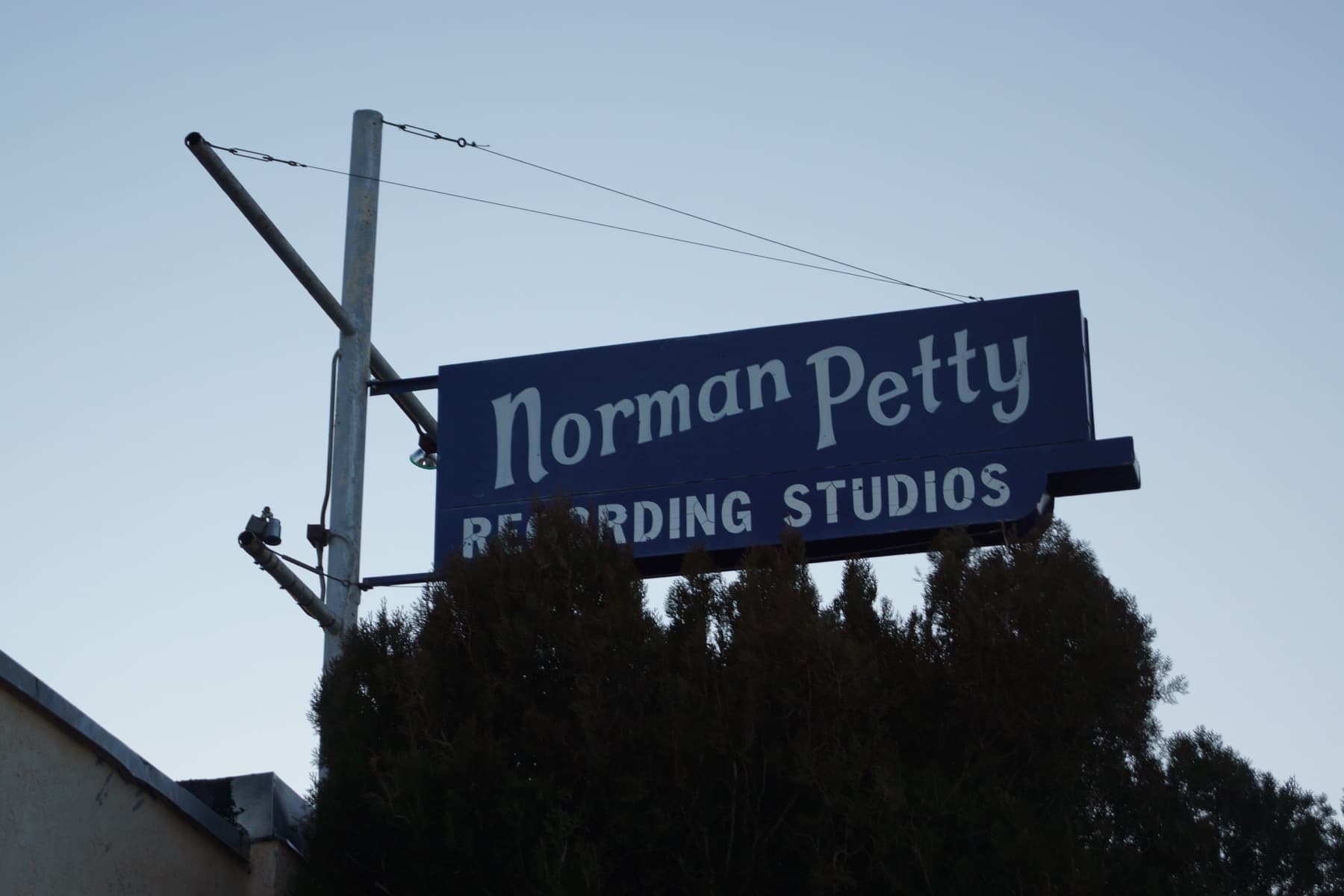 The low front of the Norman Petty Recording Studio on a quiet street