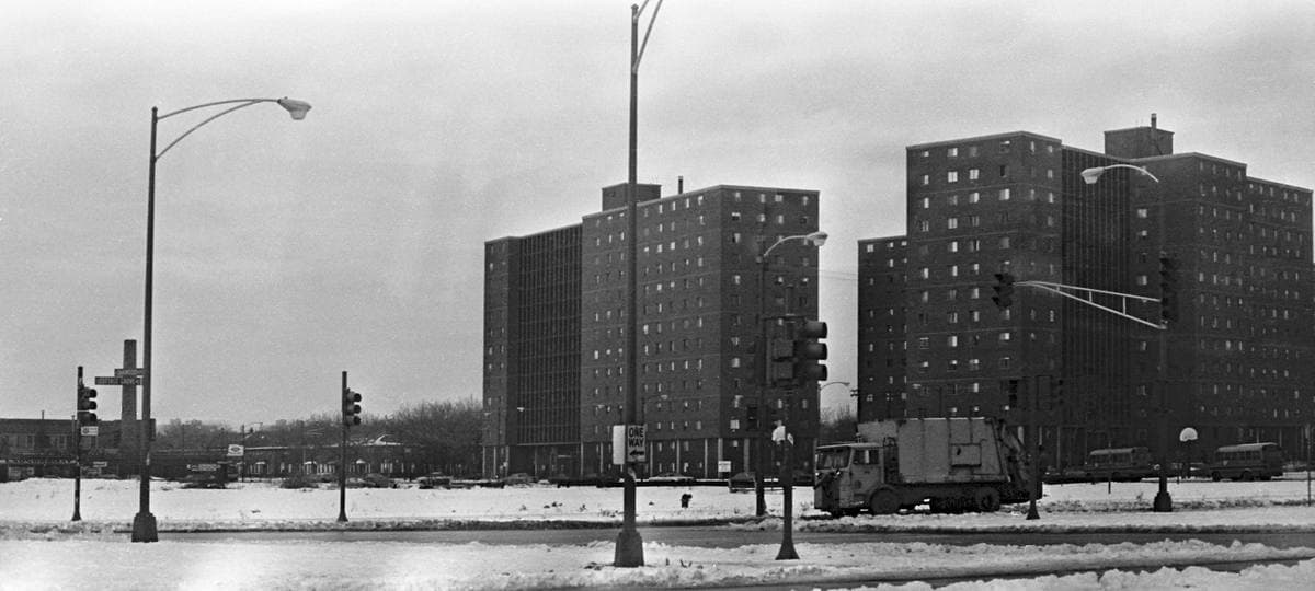 A 1978 street corner with low-rise housing blocks