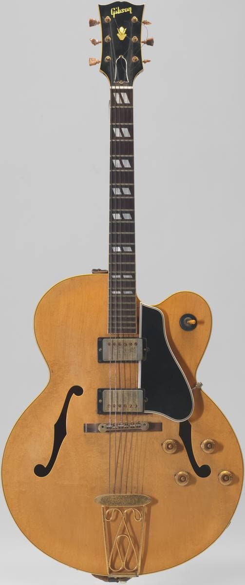 A sunburst Gibson semi-acoustic guitar
