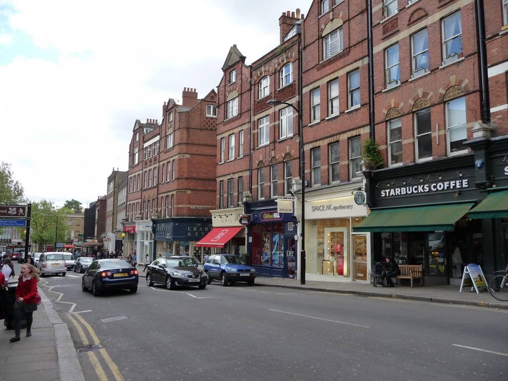 Shops along a sloping London high street
