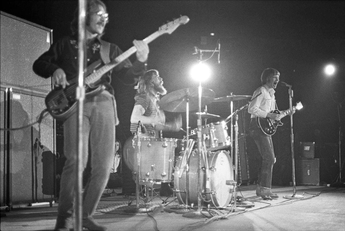 Creedence Clearwater Revival playing on a concert stage in 1969