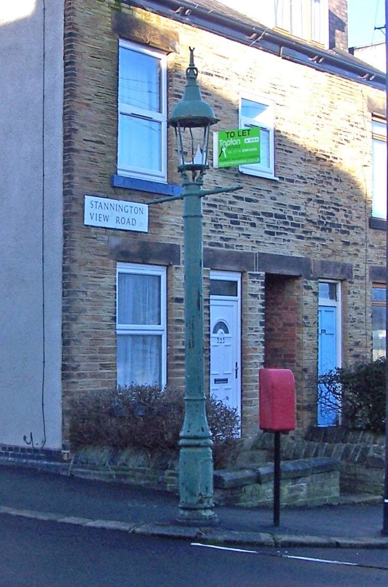 A tall Victorian sewer gas lamp on Mulehouse Road in Crookes