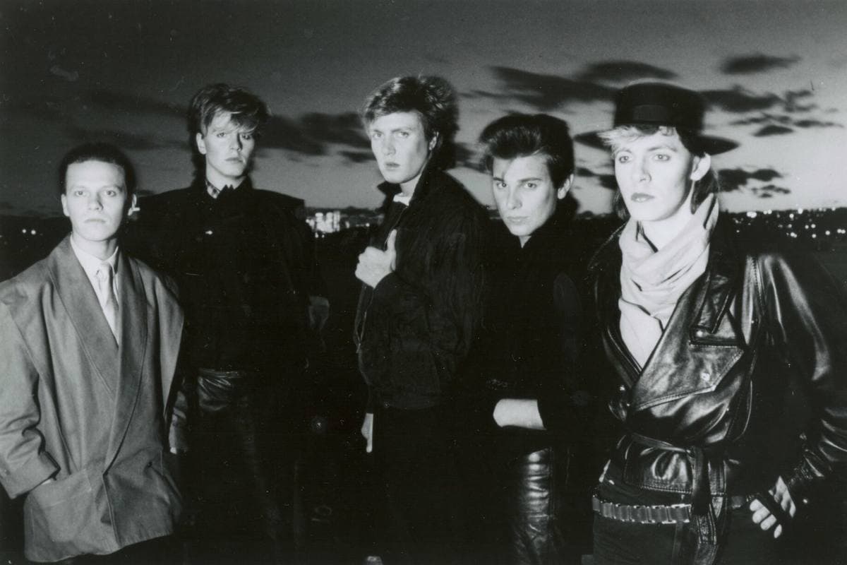 Duran Duran posed together in a 1983 publicity photograph