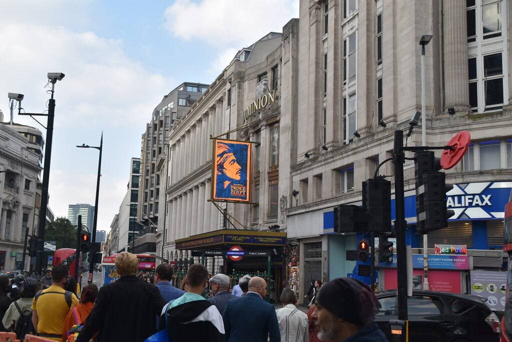 The Art Deco front of the Dominion Theatre on a London corner
