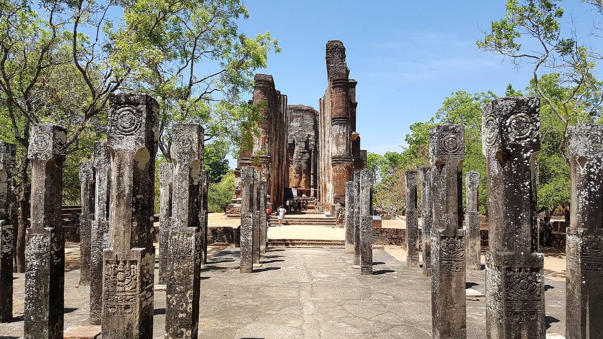 The tall brick walls of the Lankatilaka temple with a standing Buddha inside