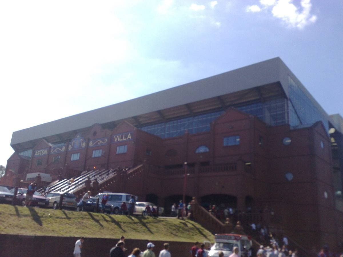 The red-brick facade of the Holte End stand at Villa Park