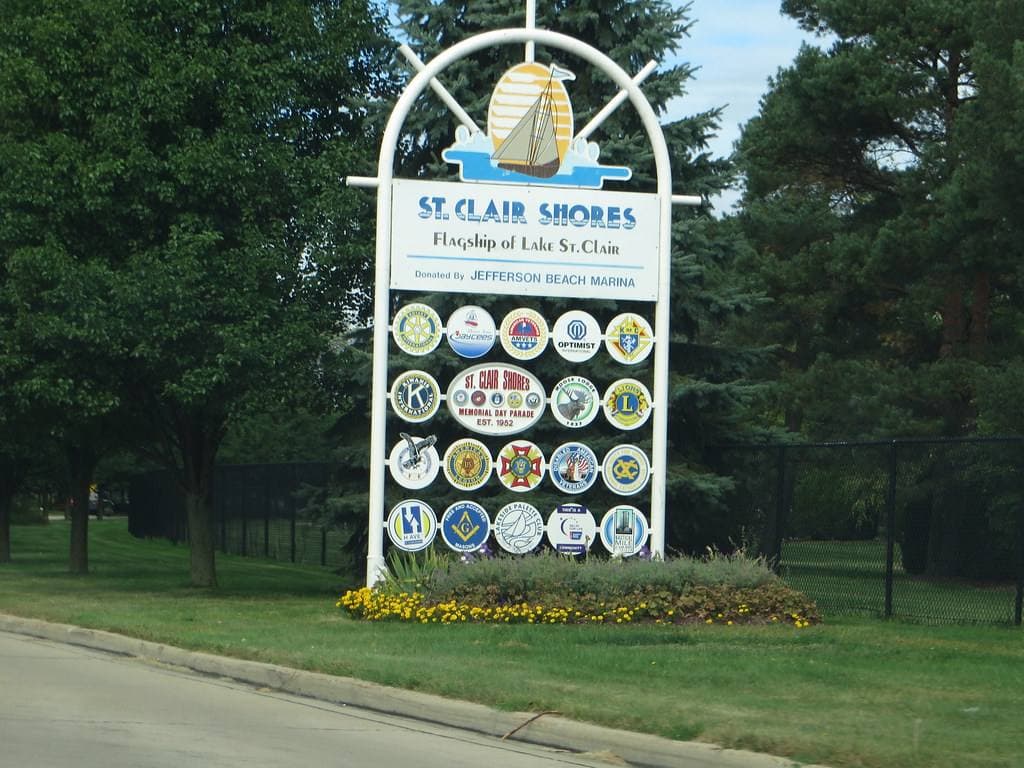 A roadside welcome sign for the city of St. Clair Shores, Michigan