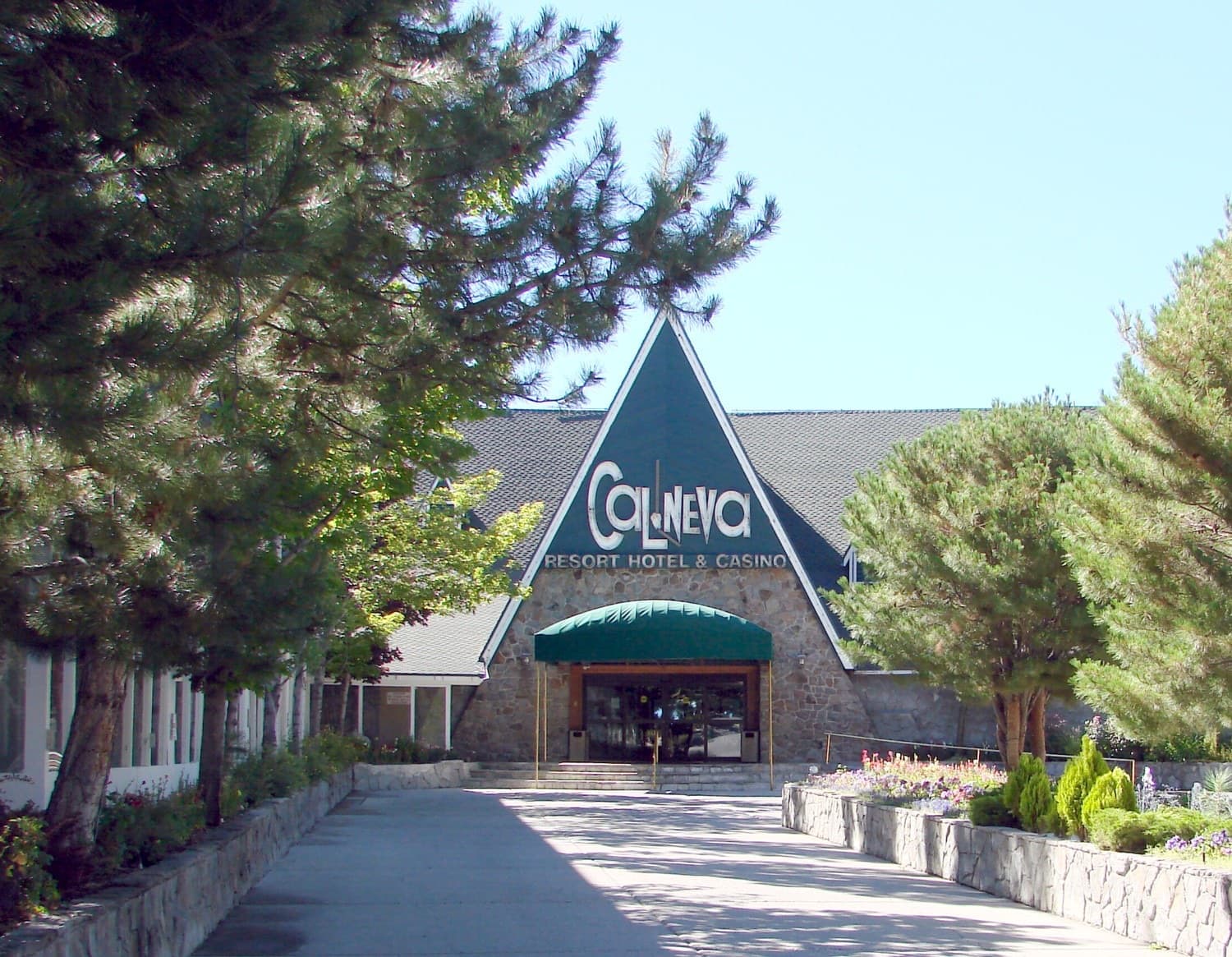 A lakeside lodge building among pines at Lake Tahoe