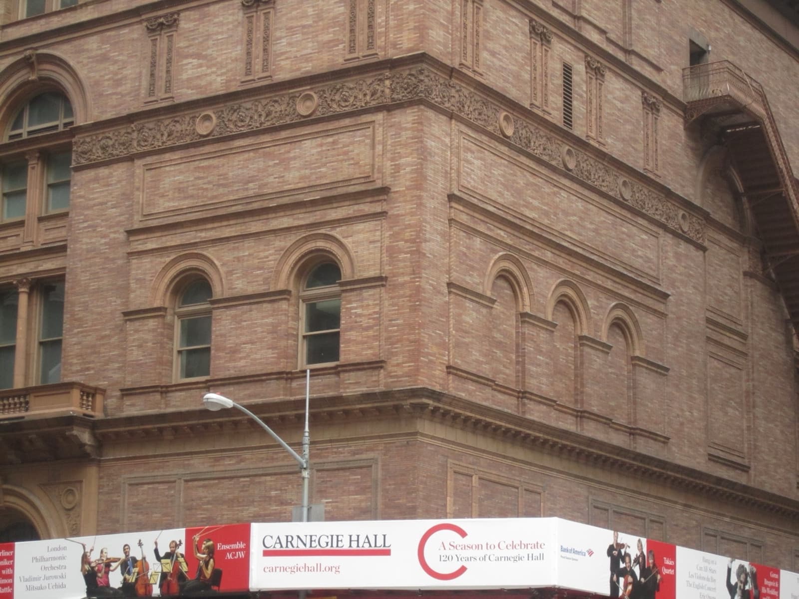 The brick and terracotta front of Carnegie Hall