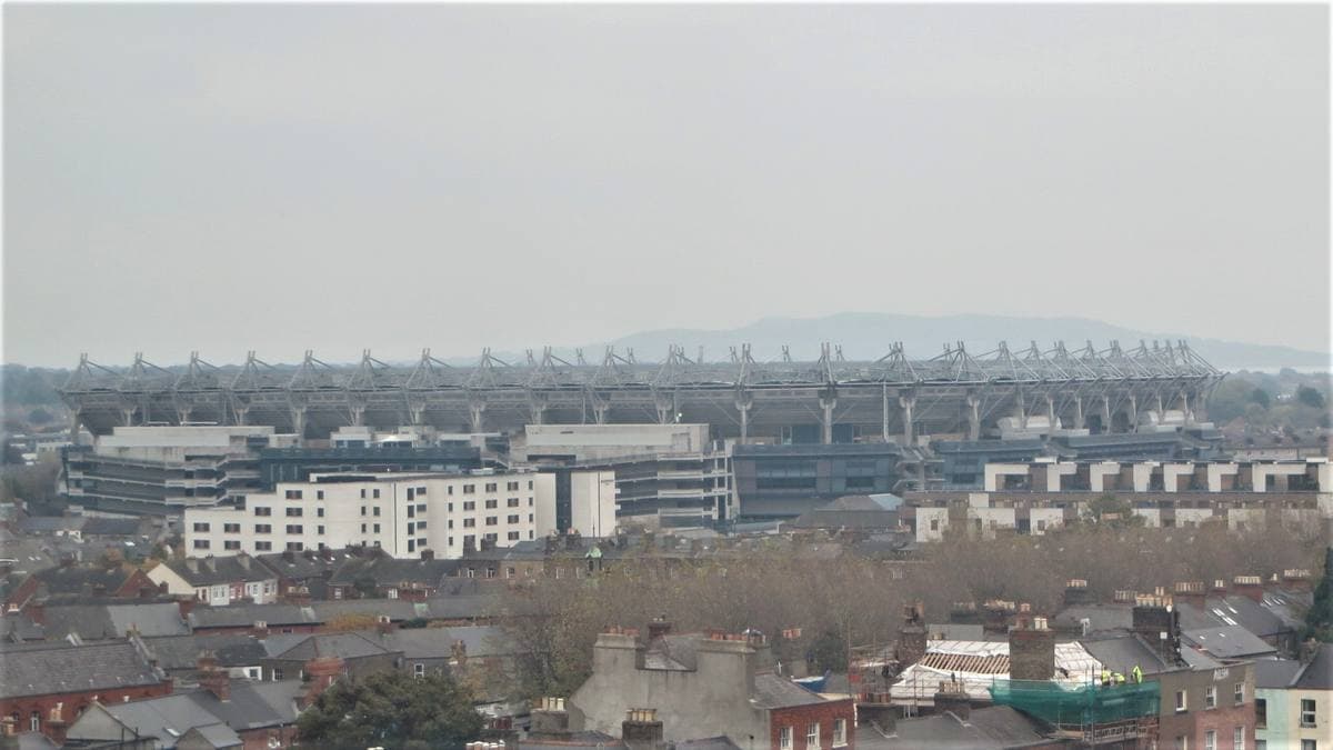 The curved stands of Croke Park rising over Dublin rooftops